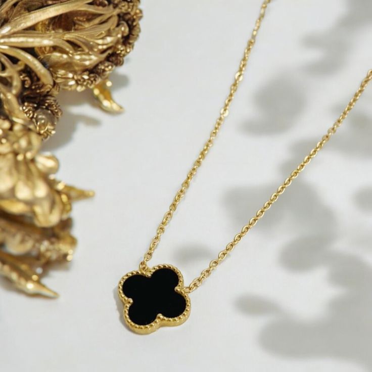 Mini black van cleef necklace